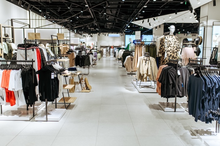 Clothing store interior with display racks